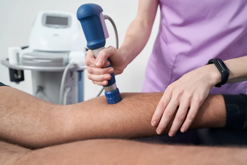 male patient receiving extracorporeal shockwave th 2026 01 05 22 53 28 utc