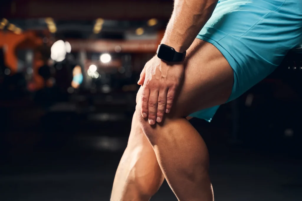 man massaging knee at the gym 2026 03 24 07 53 07 utc
